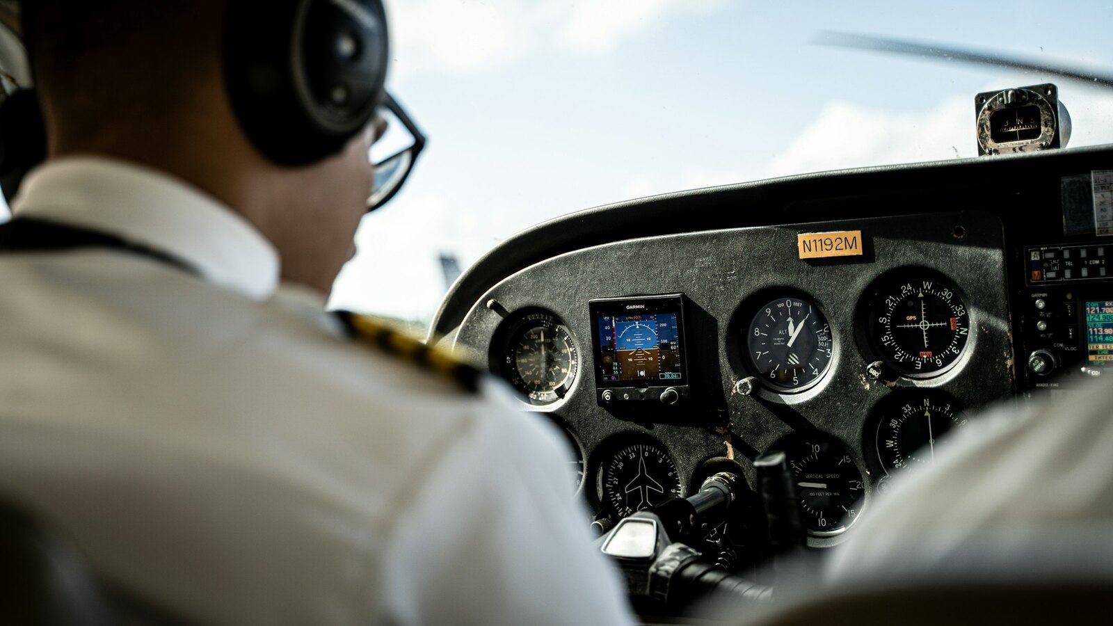 Pilot preparing in the cockpit